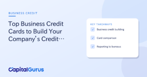 Business credit cards on a desk with financial charts and an upward arrow.